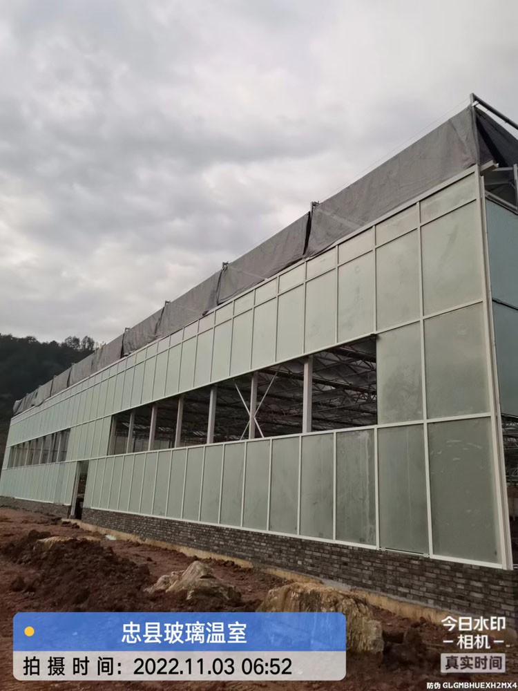 Multi-span film greenhouse installation attention